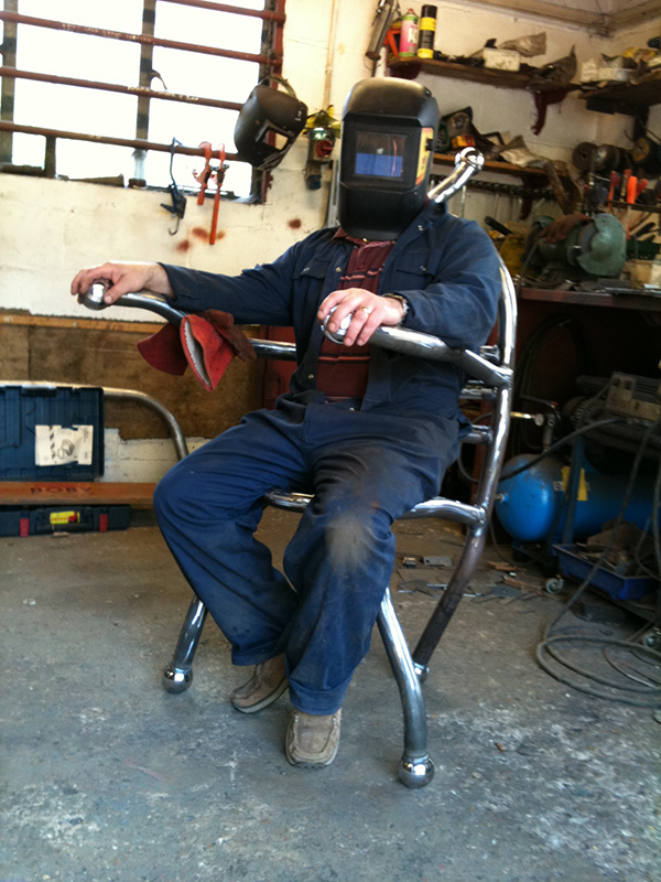 Sculptor on chair