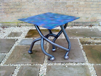 The Boule Chair - Contemporary metal table created from metal tubing and petanque balls with painted top