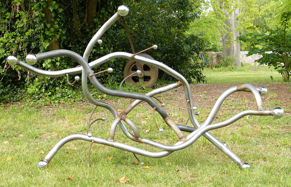 Metal sculpture titled Contorta viewed on side
