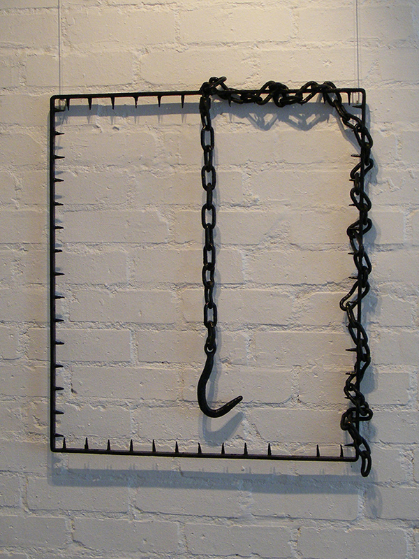 Hooked - Wall sculpture created from found objects