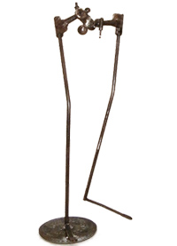 Body Sculpture - metal sculpture constructed from found objects from a plough, car parts and a weight