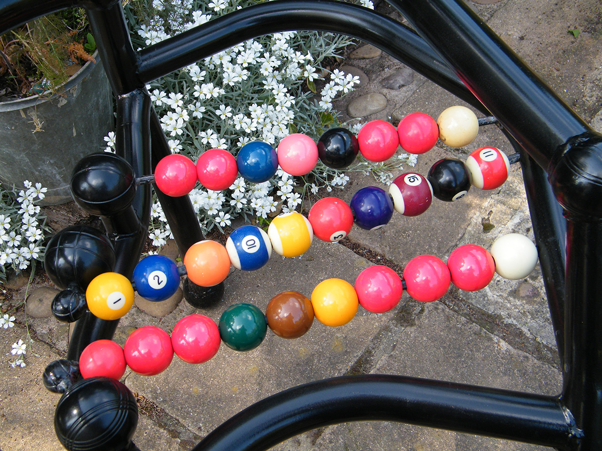 Sculptural chair detail of snooker and pool balls