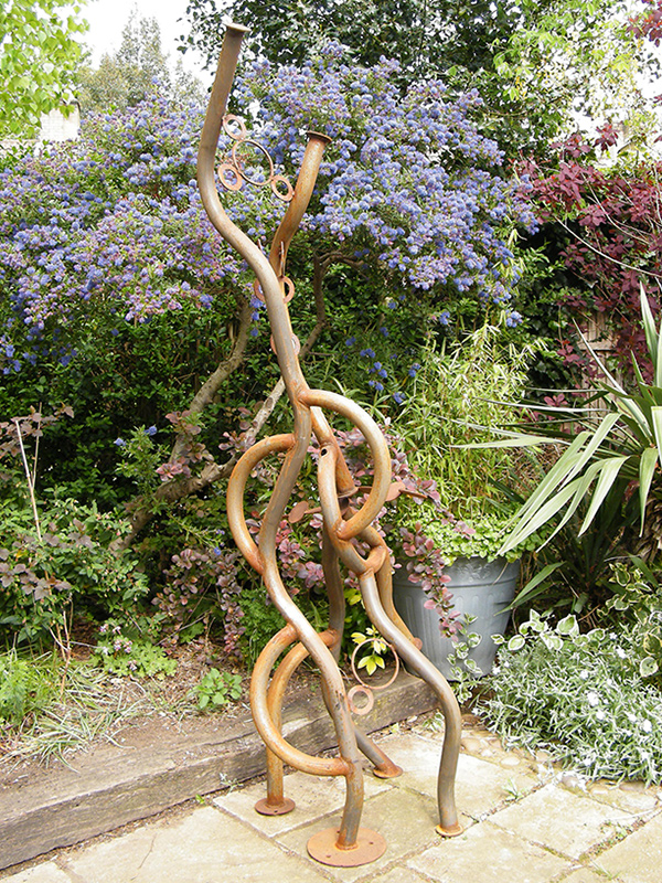 Serpentine metal sculpture